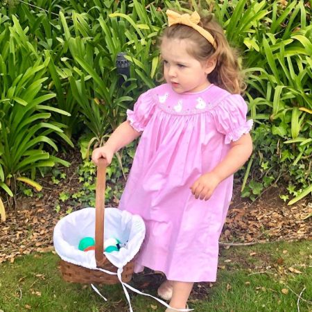 Spencer's eldest daughter, Bea in her pink dress